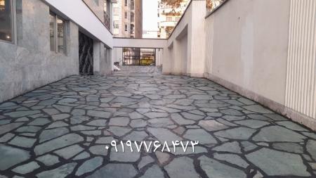 اجرای سنگ لاشه دیوار نما ویلا باغچه